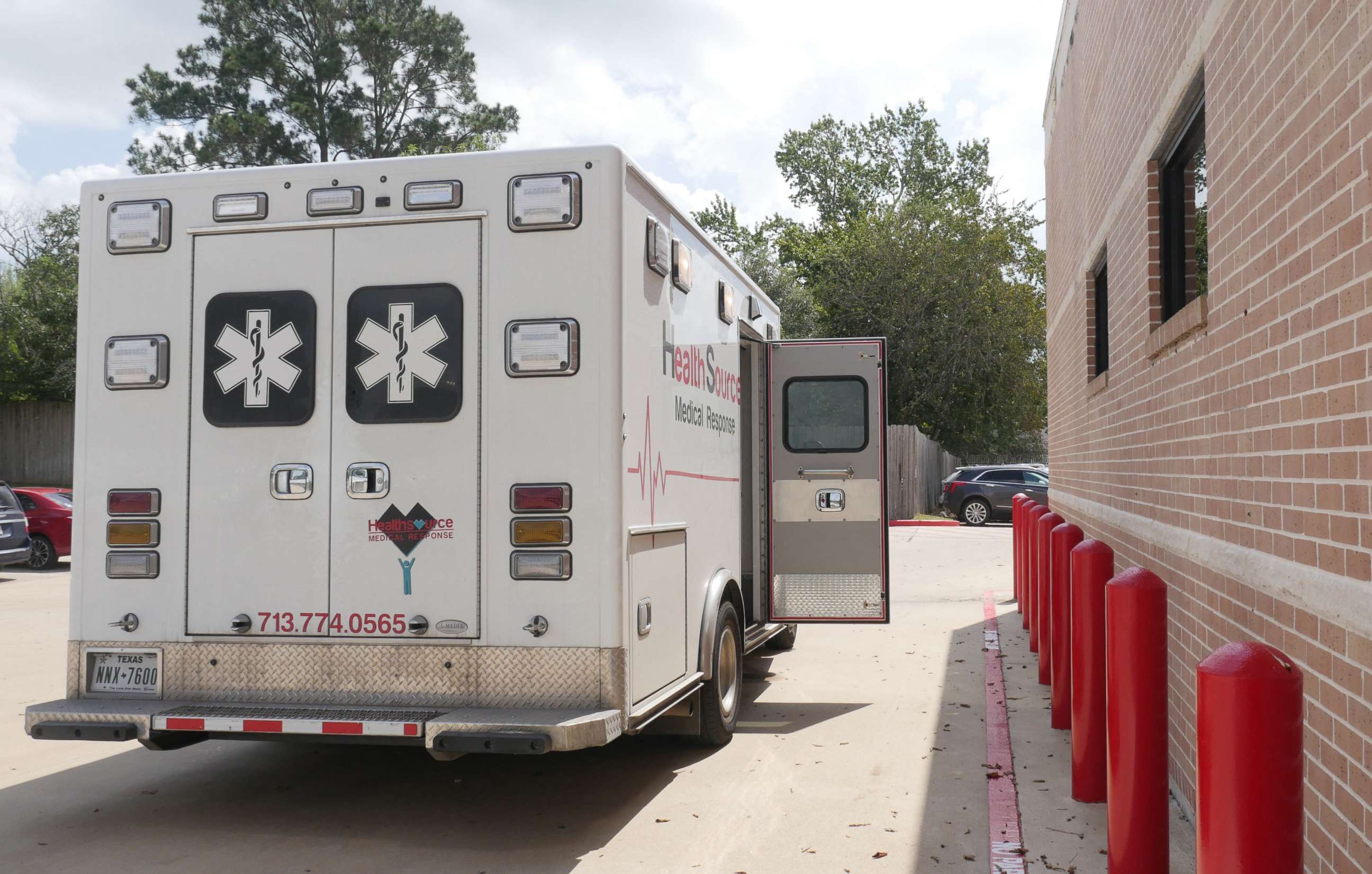 PHOTO: An ambulance is parked outside the Bellville Medical Center after dropping off a patient in Bellville, Texas, on Sept. 1, 2021.