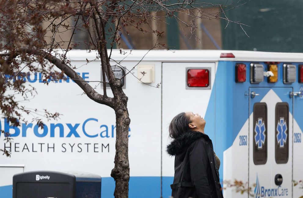 PHOTO: A woman reacts to upsetting news about a loved one outside of Bronx-Lebanon Hospital Center in the Bronx, New York, April 9, 2020.