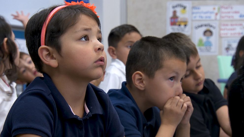 PHOTO: Amelia Guana, a 5 year old kindergartener, listens during active shooter training.