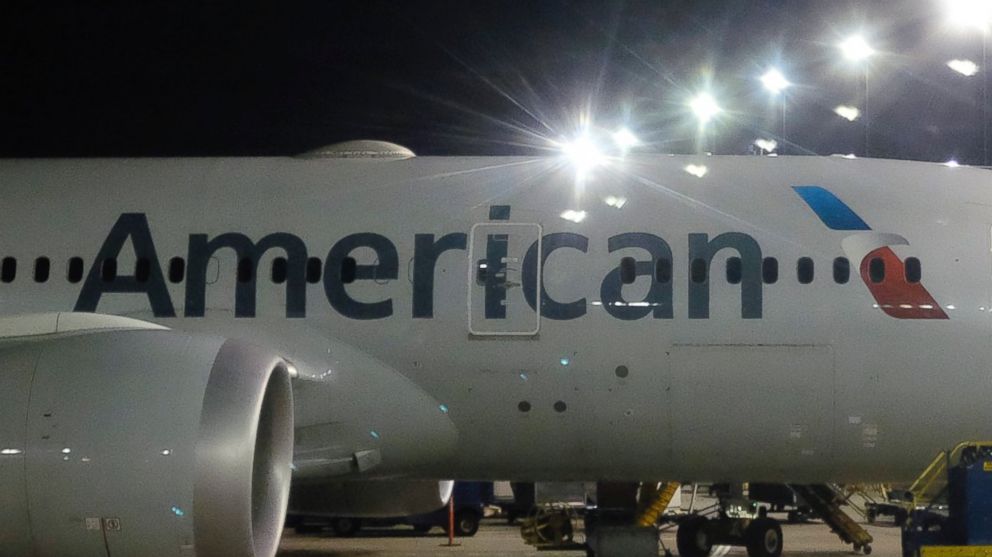 This Nov. 25, 2017 file photo shows an American Airlines plane parked at a gate.