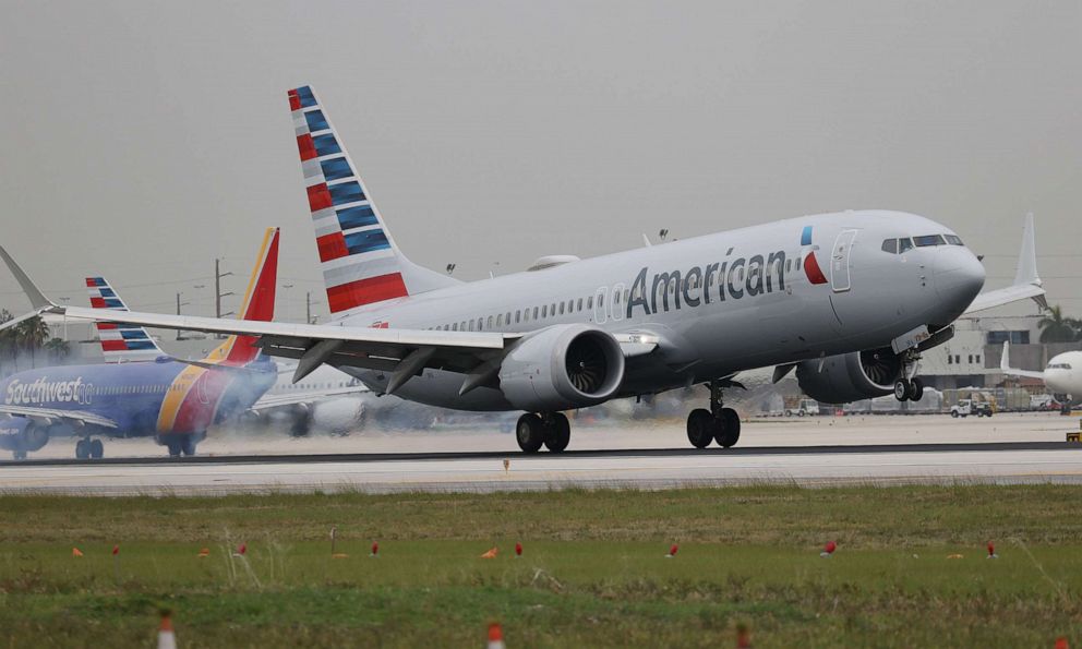 PHOTO: An American Airlines plane lands at the Miami International Airport on June 16, 2021, in Miami, Fla.