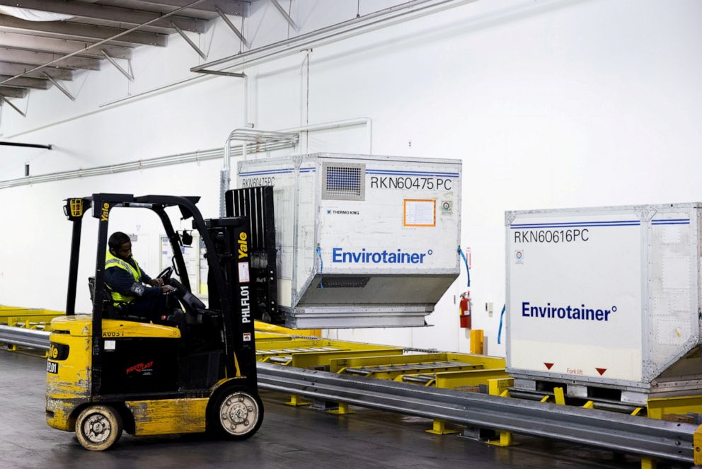PHOTO: A worker drives a forklift at the American Airlines' cold storage facility, the largest facility for pharmaceutical products on the East Coast, that could soon be used to store COVID_19 vaccines at Philadelphia International Airport, Dec, 4, 2020.