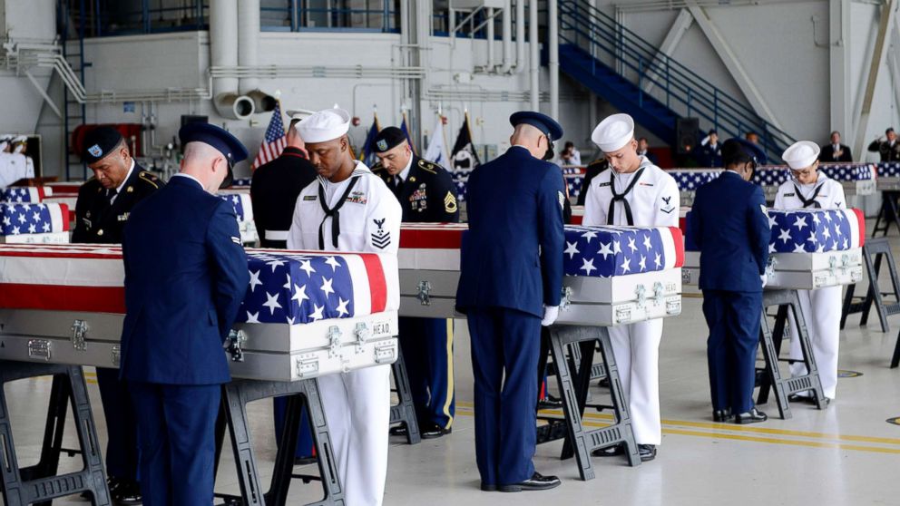 PHOTO: Military honor guards carry the remains of American soldiers repatriated from North Korea during a repatriation ceremony after arriving to Joint Base Pearl Harbor-Hickam, Honolulu, Aug. 1, 2018.