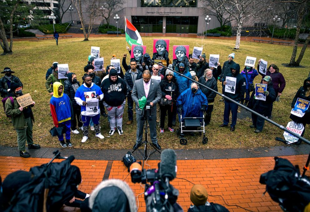 PHOTO: People gather for a news conference outside the Hennepin County Government Center on April 6, 2022, in Minneapolis.
