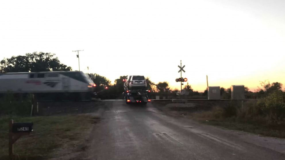 PHOTO: A still from a bystander's video taken right before an Amtrak train collided with a car hauler semi-truck in Thackerville, Oklahoma, on Oct. 15, 2021.