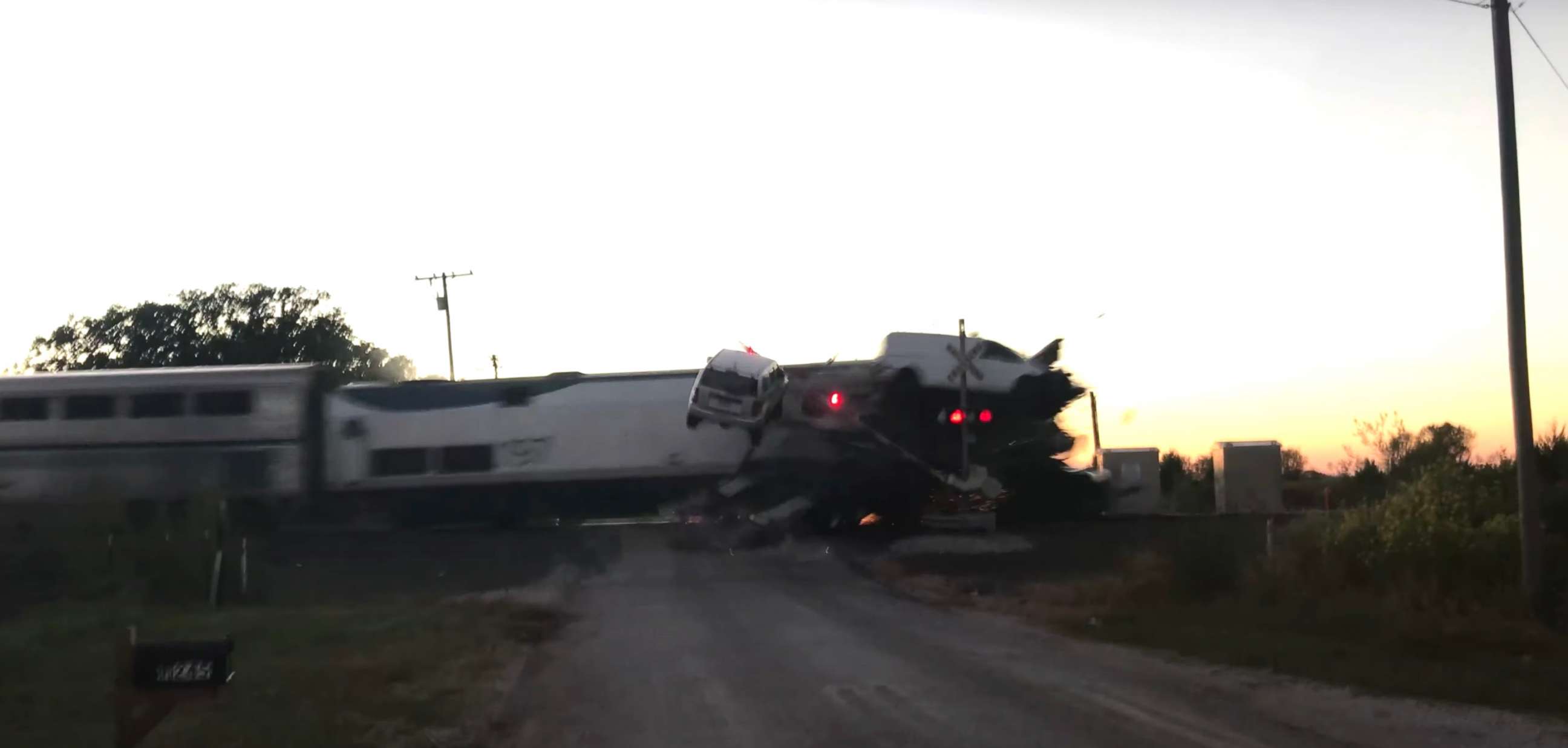 PHOTO: A still from a bystander's video capturing an Amtrak train colliding with a car hauler semi-truck in Thackerville, Oklahoma, on Oct. 15, 2021.