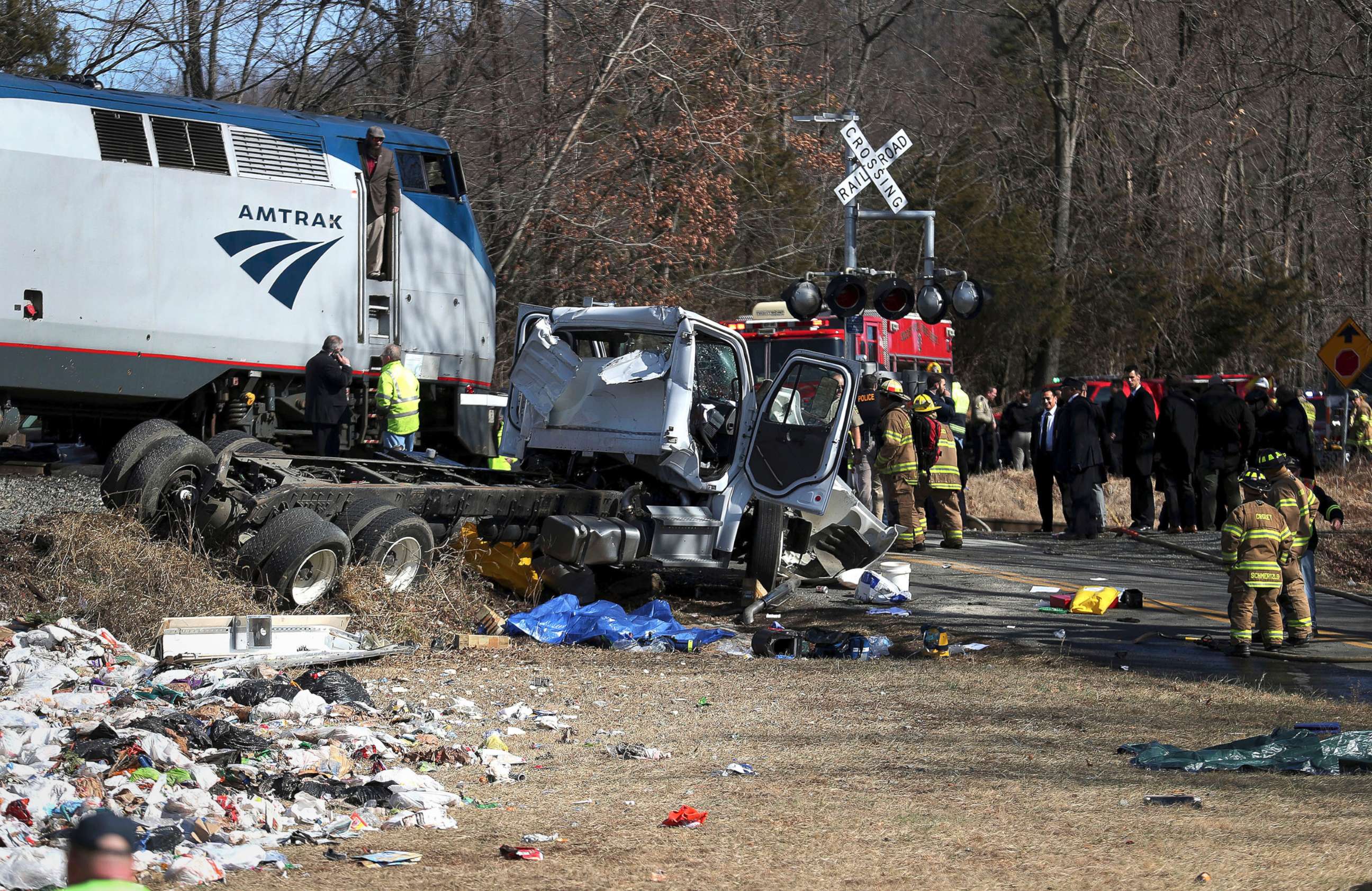 PHOTO: Emergency personnel work at the scene of a train crash involving a garbage truck in Crozet, Va., Jan. 31, 2018. 