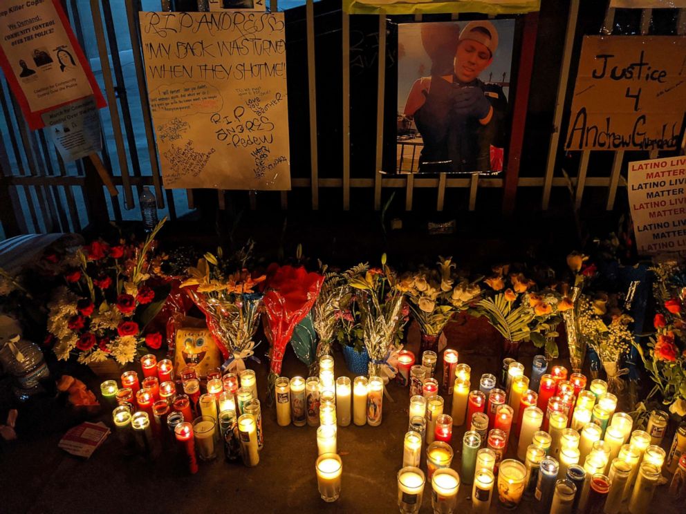 PHOTO: Candles and flowers are set next to an image of Andres Guardado, 18, who was fatally shot by a Los Angeles County sheriff's deputy, at a memorial site in Gardena, Calif.