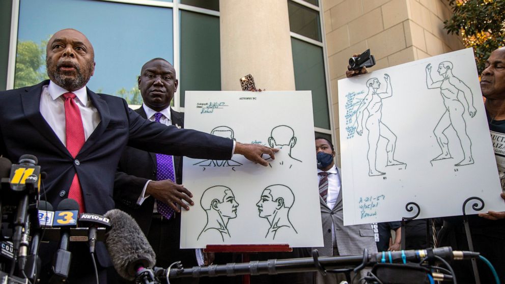 PHOTO: Attorneys for Andrew Brown Jr.'s family, Wayne Kendall, left, and Ben Crump hold a news conference, April 27, 2021, outside the Pasquotank County Public safety building in Elizabeth City, N.C., to announce results of the autopsy they commissioned.
