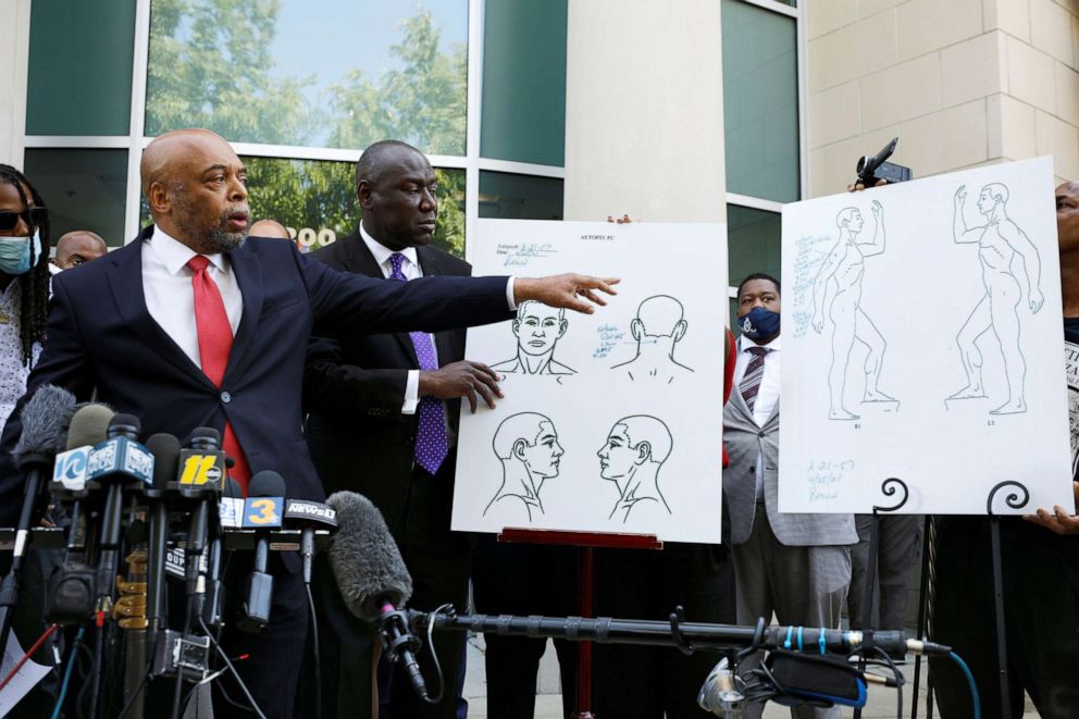 PHOTO: Attorneys Wayne Kendall and Ben Crump refer to diagrams identifying the bullet wounds sustained by Andrew Brown Jr. at a news conference in Elizabeth City, North Carolina, April 27, 2021.