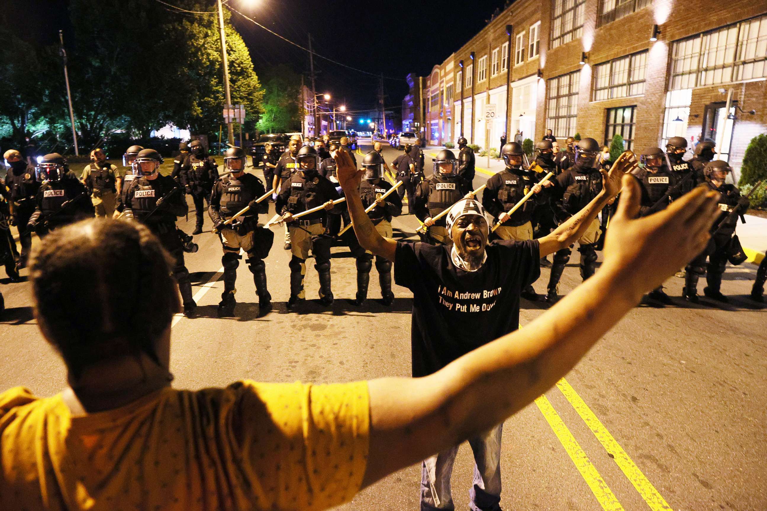 PHOTO: Police in riot gear force people off a street as they protest the killing of Andrew Brown Jr., April 27, 2021, in Elizabeth City, North Carolina.