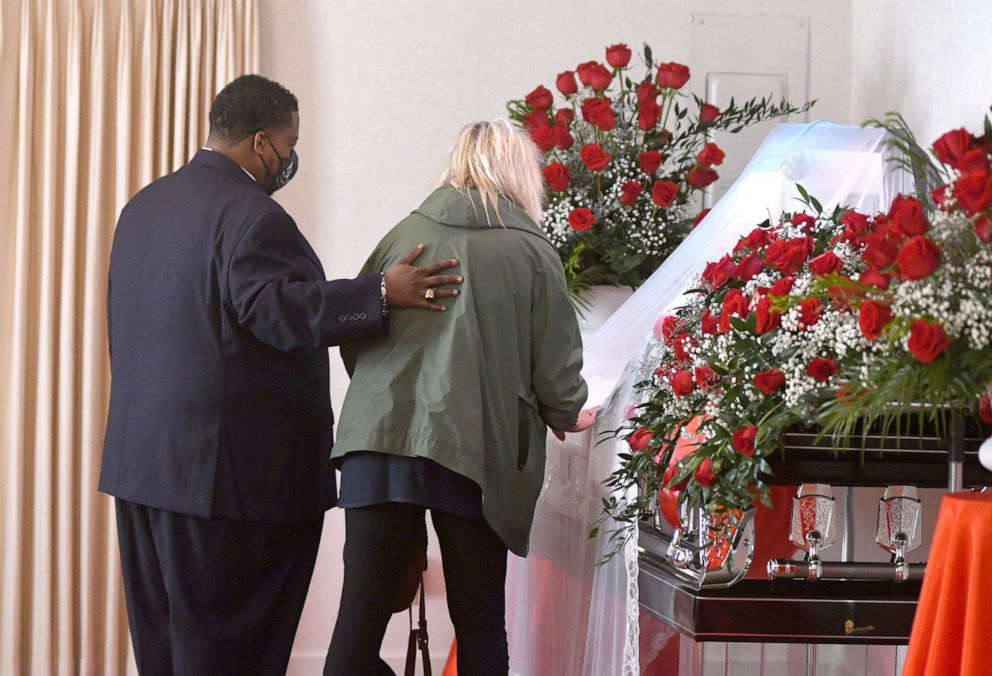 PHOTO: Horton's Funeral Home Director Darius Horton stands with a person as they pay their respects during the public viewing for Andrew Brown Jr. in Hertford, N.C., May 2, 2021. Brown was killed as sheriff's deputies tried to execute warrants.