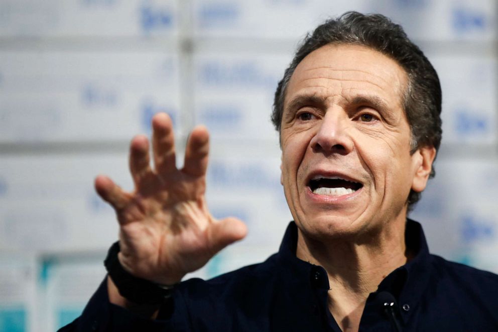 PHOTO: In this March 24, 2020 photo, New York Gov. Andrew Cuomo speaks during a news conference against a backdrop of medical supplies at the Jacob Javits Center in New York.