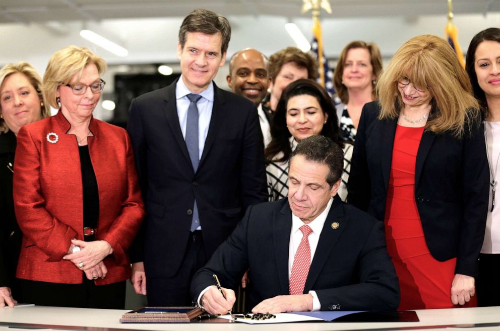 PHOTO: New York Gov. Andrew Cuomo, center, signs the Child Victims Act in New York, Thursday, Feb. 14, 2019.