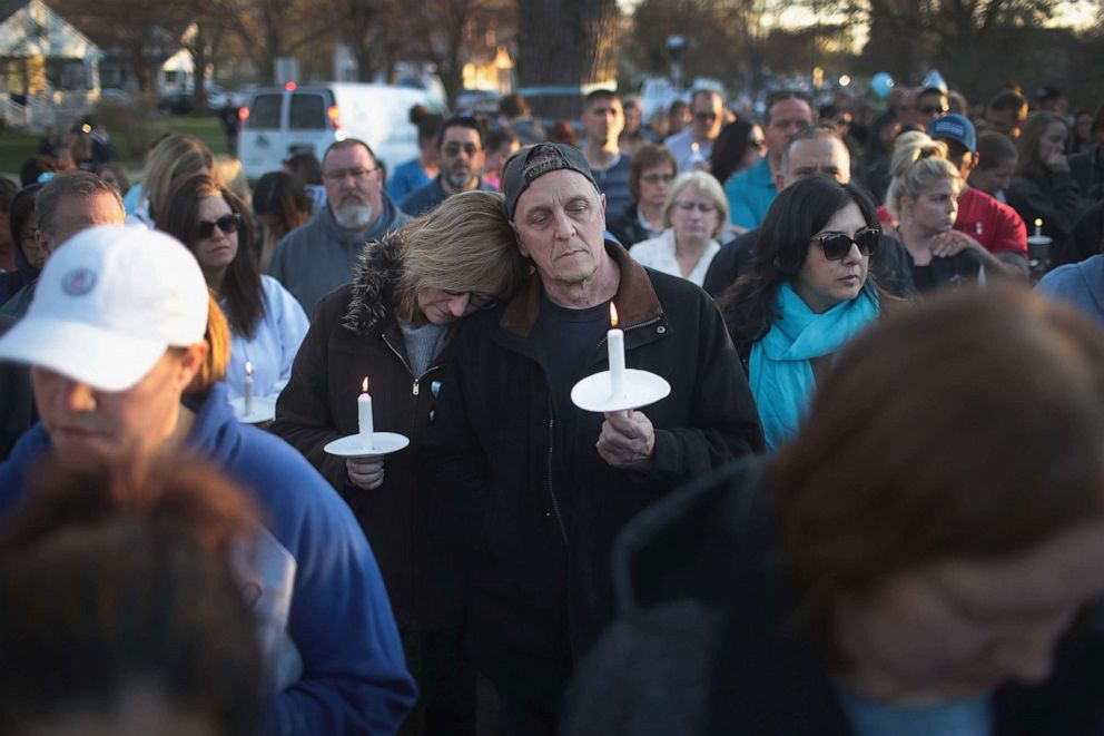 PHOTO: Mourners gather for a vigil outside the home of five-year-old Andrew "A.J." Freund on April 24, 2019 in Crystal Lake, Ill.