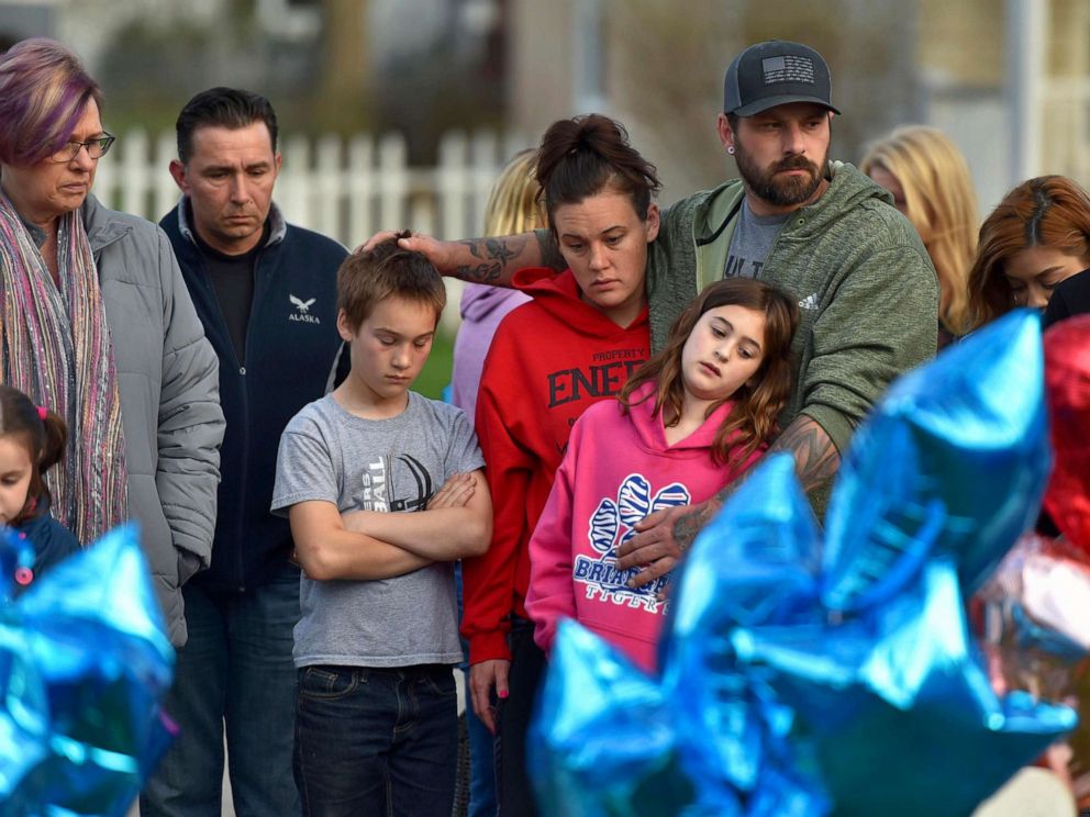 PHOTO: In this Wednesday, April 24, 2019 photo, community members in Crystal lake, Ill., hold a vigil in memory of 5-year-old Andrew AJ Freund.