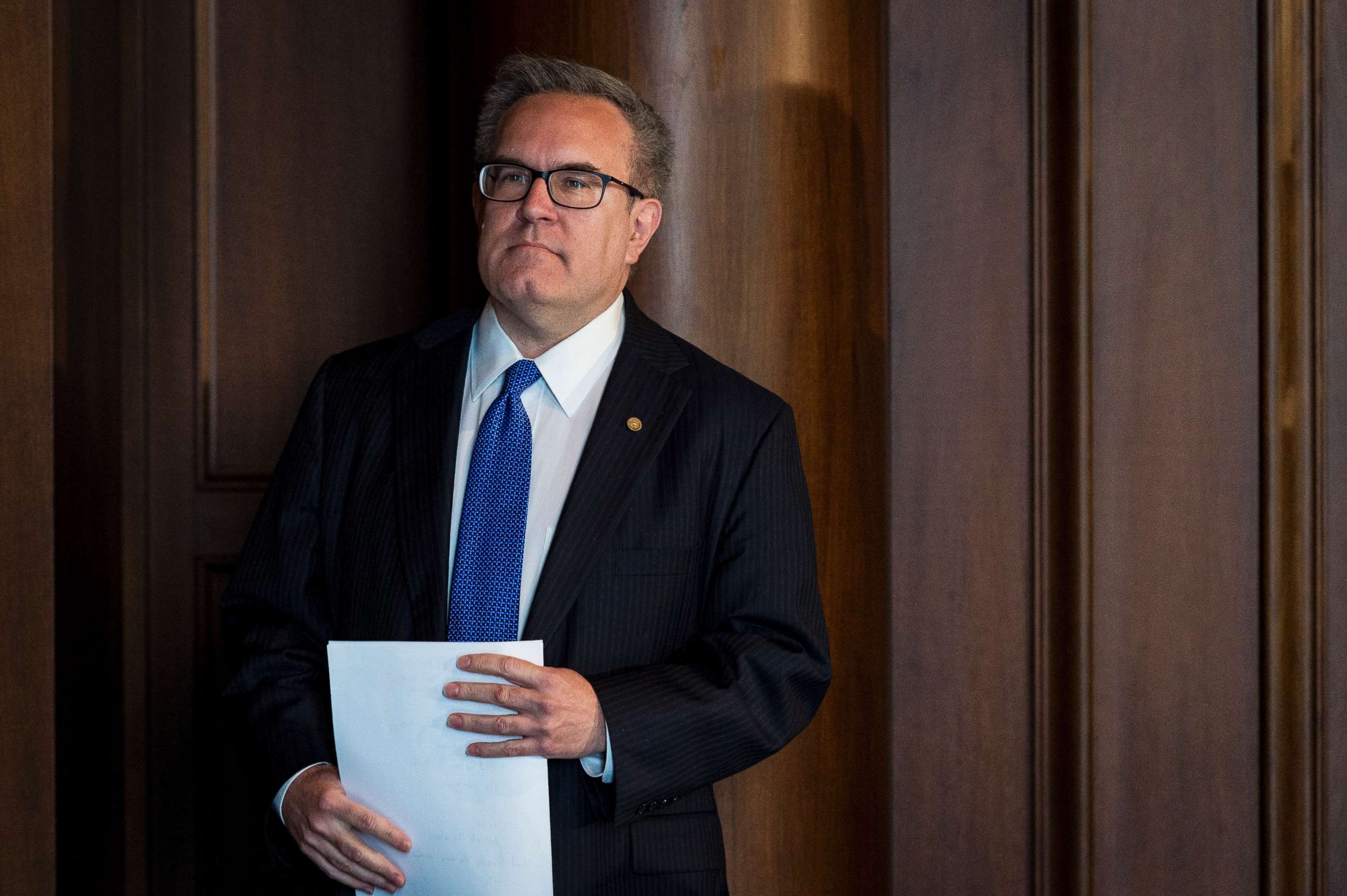 PHOTO: Andrew Wheeler, the Environmental Protection Agency's acting administrator, waits as he is introduced to address staff at the administration's headquarters in Washington, July 11, 2018.