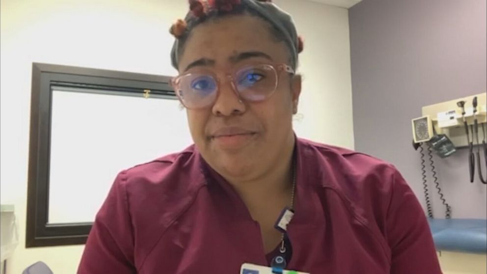 PHOTO: Single mothers like Angel Marino, a certified medical assistant in Detroit, have no choice but to keep reporting for her job at the hospital.
