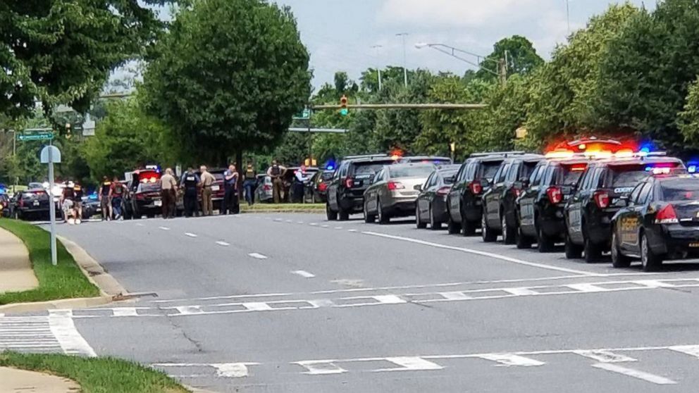 PHOTO: First responders gather after reports of a shooting in the offices of the Capital Gazette in Annapolis, Md., June 28, 2018.