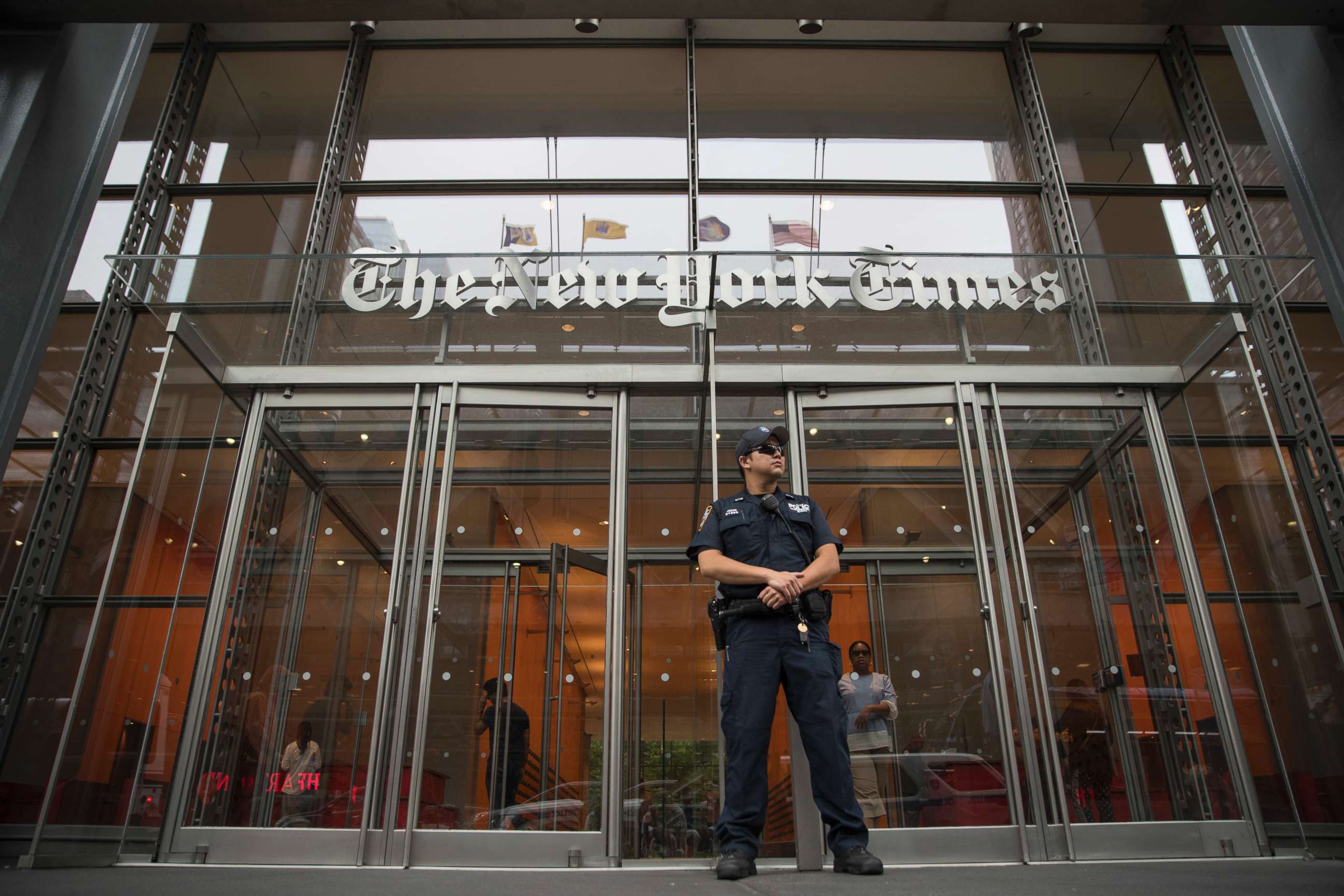 PHOTO: A police officer stands guard outside The New York Times building, June 28, 2018, in New York.