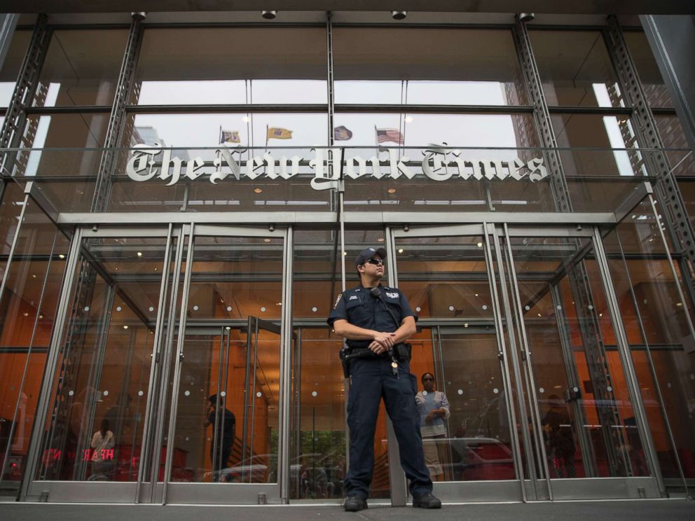 PHOTO: A police officer stands guard outside The New York Times building, June 28, 2018, in New York.