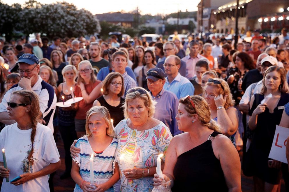 PHOTO: Mourners stand in silence during a vigil in response to a shooting at the Capital Gazette newsroom on June 29, 2018, in Annapolis, Md.