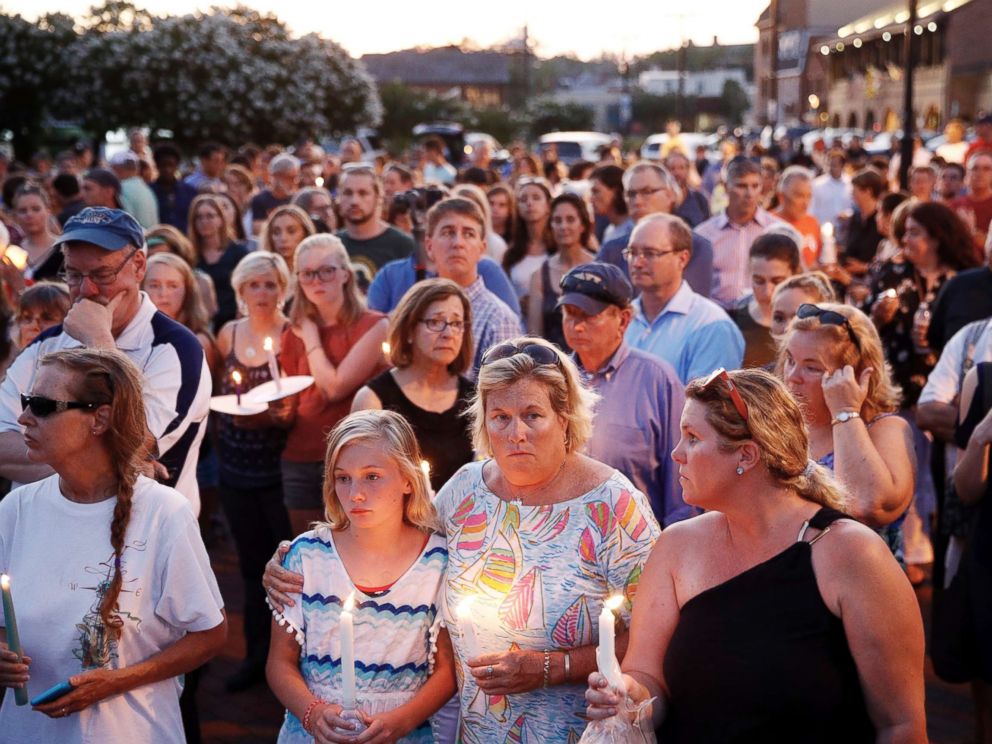 PHOTO: Mourners stand in silence during a vigil in response to a shooting at the Capital Gazette newsroom on June 29, 2018, in Annapolis, Md.