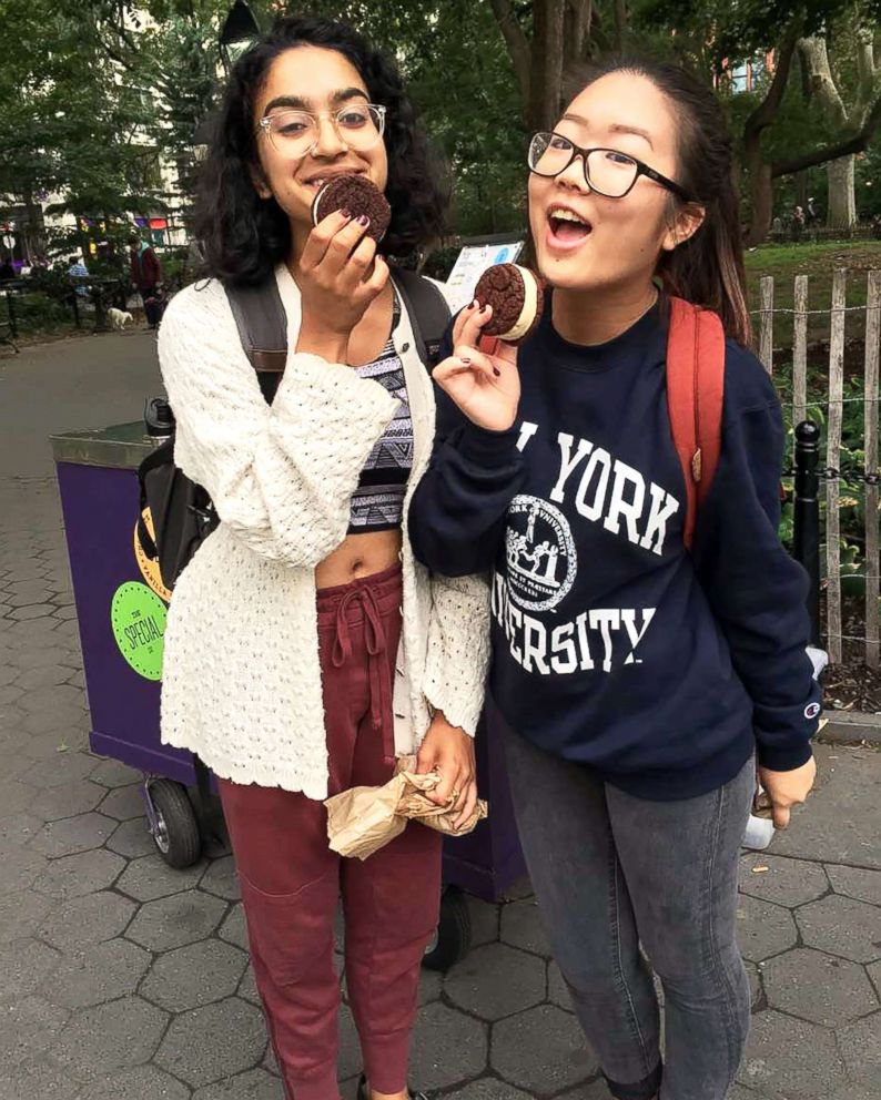 PHOTO: First generation college student Annette Kaminaka (right) and a friend explore the campus around New York University.