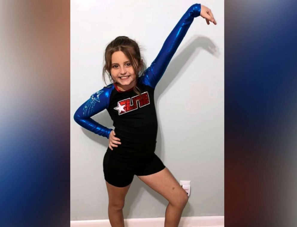 PHOTO: Annistyn Rackley, 9, poses for a picture while attending a cheerleading competition in Arizona.