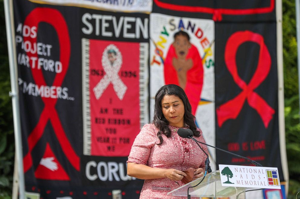 PHOTO: San Francisco Mayor London Breed looks down after speaking during the 40th Anniversary of the AIDS Pandemic at the National AIDS Memorial Grove at Golden Gate Park in San Francisco, June 5, 2021. 