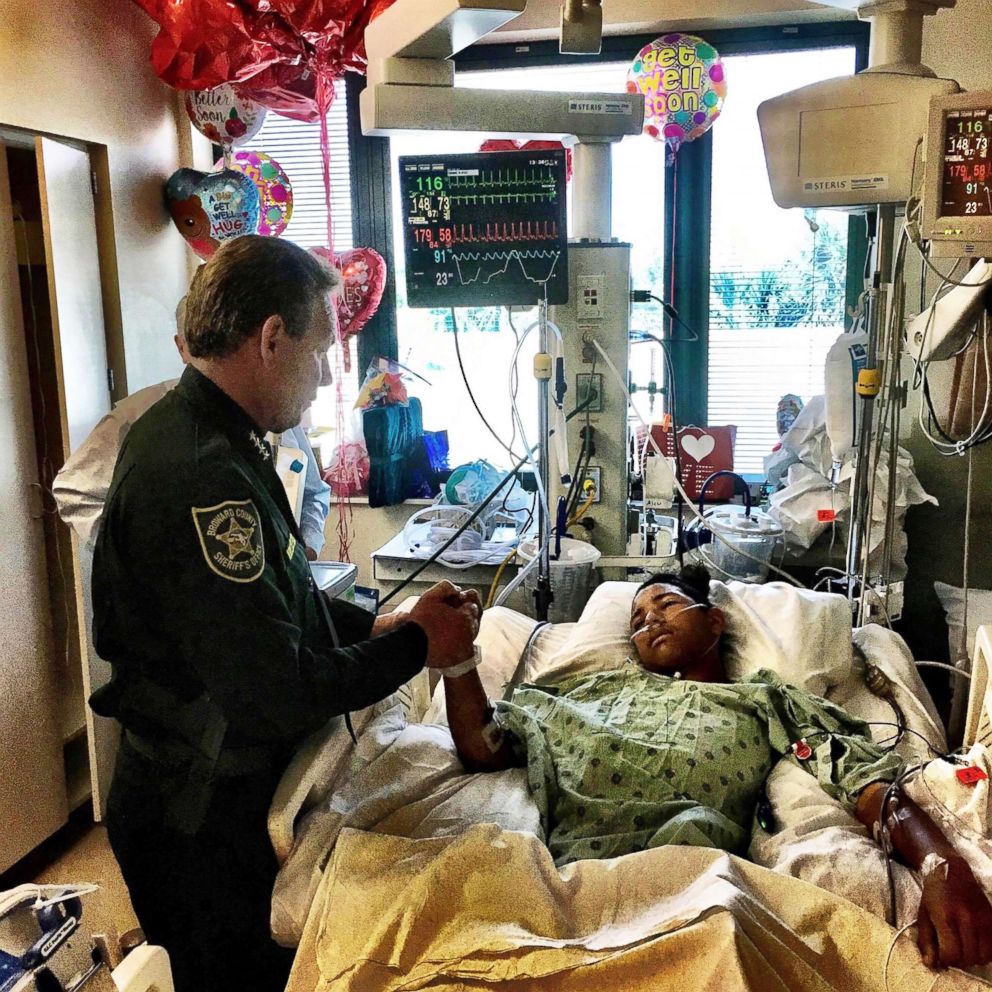 PHOTO: Sheriff Israel of Broward Sheriff's Office visits Anthony Borges, 15, in hospital on Feb. 18, 2018.