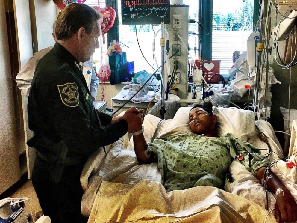 PHOTO: Sheriff Israel of Broward Sheriffs Office visits Anthony Borges, 15, in hospital on Feb. 18, 2018.