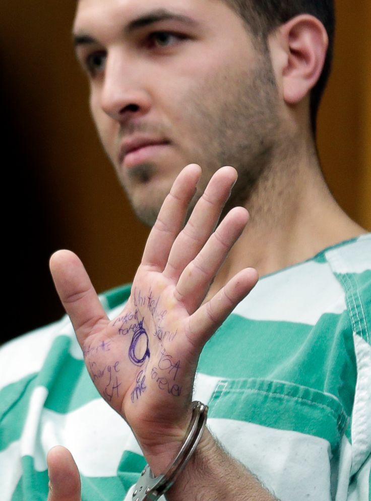 PHOTO: Anthony Comello displays writing on his hand during his extradition hearing in Toms River, N.J., March 18, 2019.