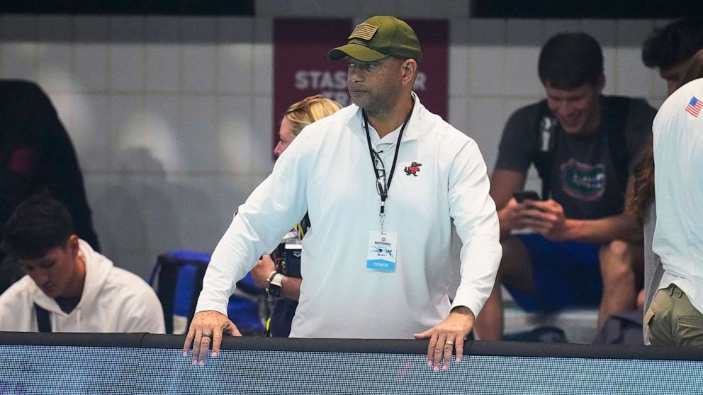 PHOTO: Coach Anthony Nesty watches as swimmers warm up at the U.S. nationals swimming meet in Indianapolis, June 27, 2023.