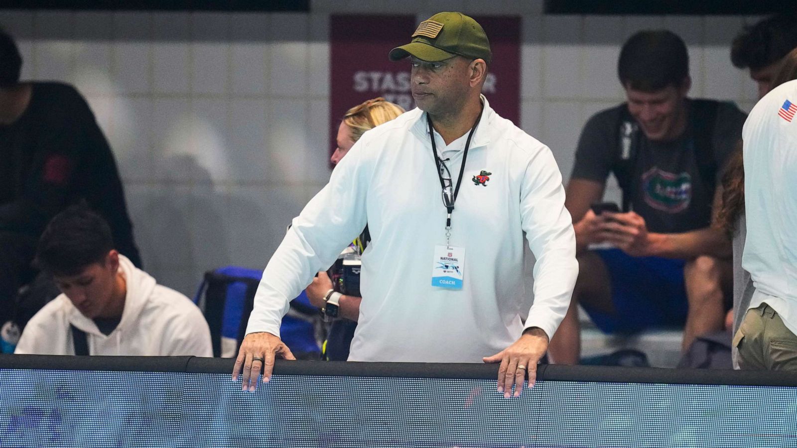 PHOTO: Coach Anthony Nesty watches as swimmers warm up at the U.S. nationals swimming meet in Indianapolis, June 27, 2023.