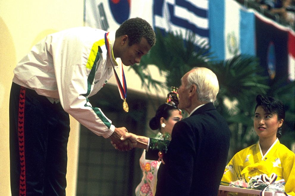 PHOTO: Swimmer Anthony Nesty of Suriname receives his gold medal after winning the men's 100m butterfly final at the Olympics in Seoul, South Korea, Sept. 21, 1988.