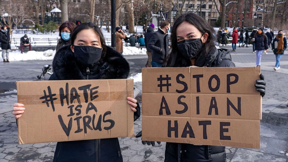 PHOTO: Protesters hold placards during a demonstration in Washington Square Park, Feb. 20, 2021, in New York City.