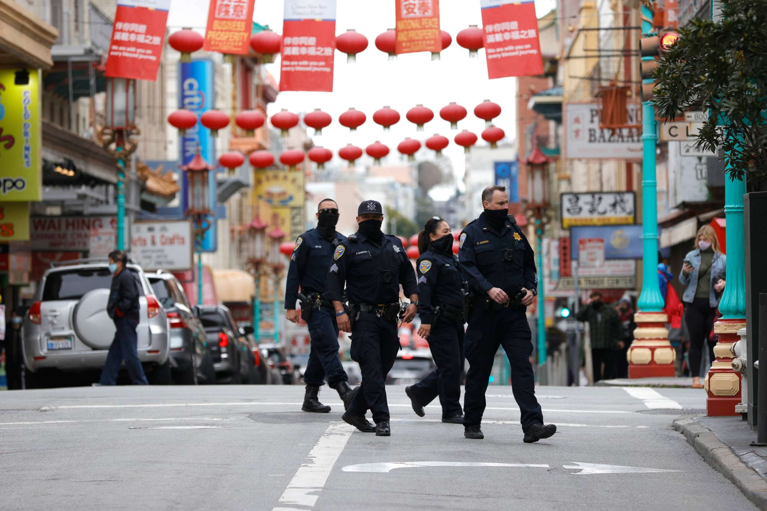 PHOTO: San Francisco police officers patrol Chinatown on March 17, 2021, in San Francisco.