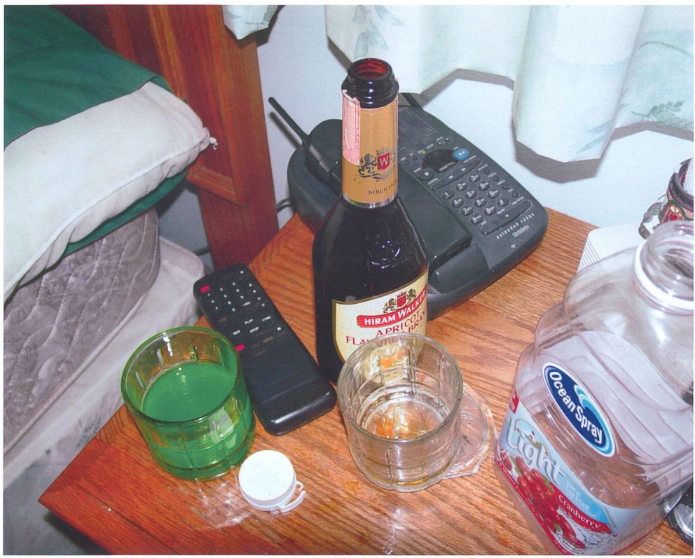 Police found a glass of green liquid on the bedside table next to where David Castor was found dead.