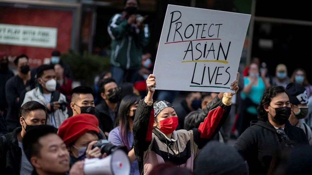 PHOTO: People participate in a Stop Asian Hate rally at Times Square in New York City,  April 4, 2021.