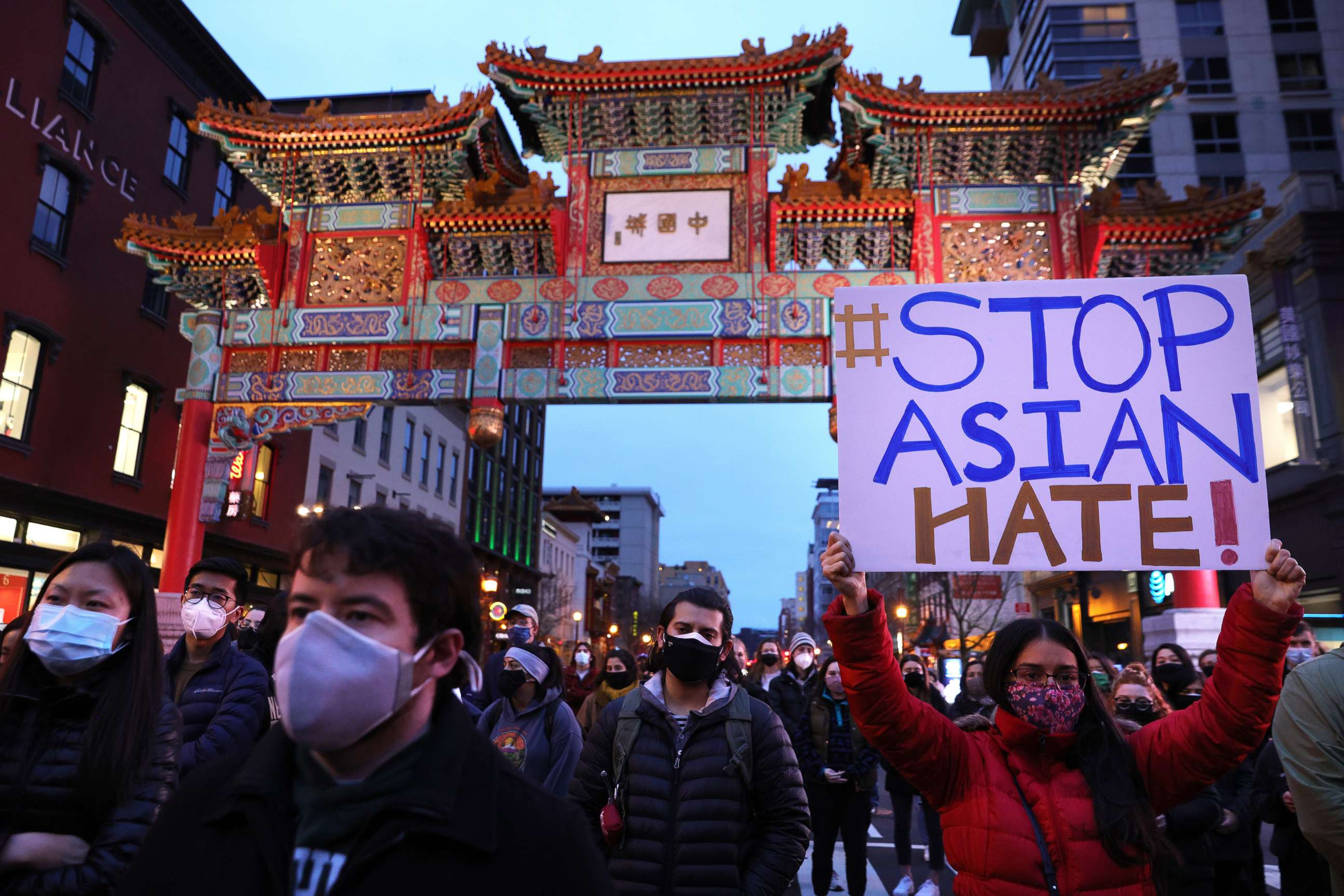 PHOTO: Activists participate in a vigil in response to the Atlanta spa shootings in which eight people were killed, March 17, 2021, in the Chinatown area of Washington, D.C.