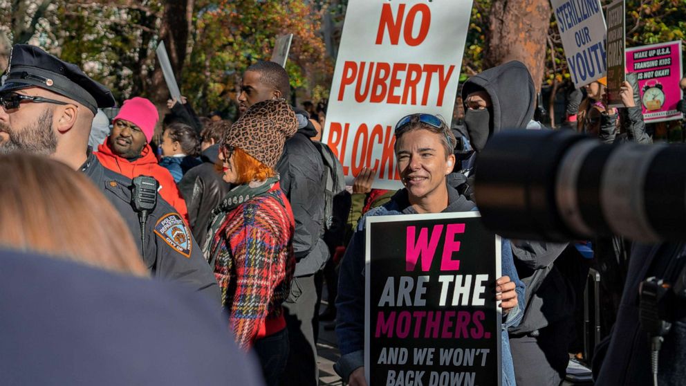 PHOTO: Kellie-Jay Keen supporters and trans exclusionary radical feminist members are greeted by counter-protesters outside City Hall.  The British author was on a nationwide speaking tour, ending in New York on November 14, 2022.