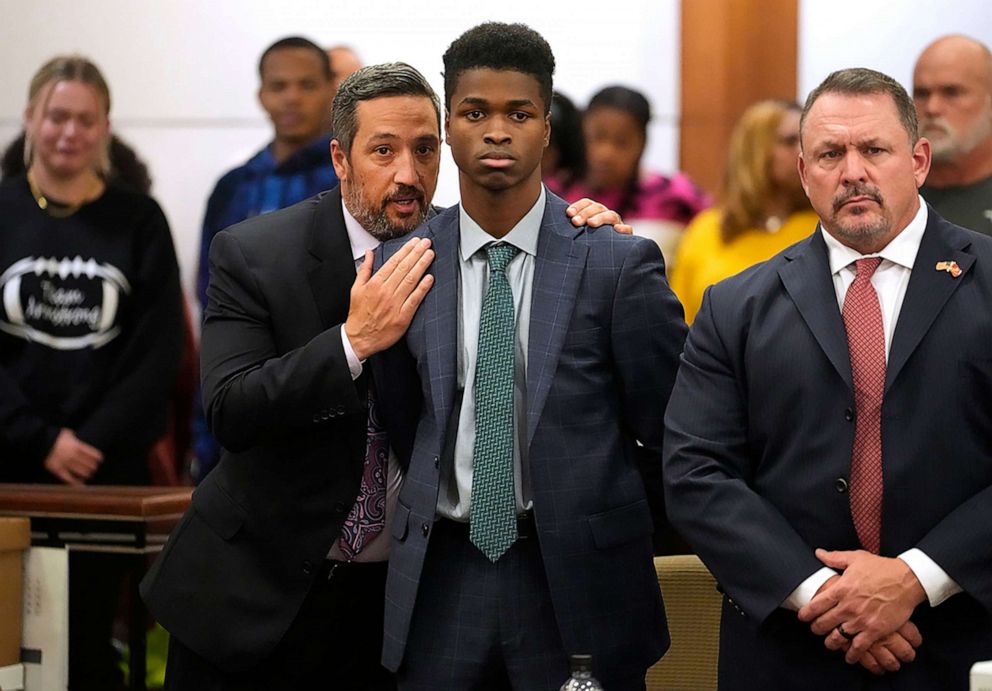 PHOTO: Defense attorneys Rick Detoto (left) and Chris Collings (right) and a client in the 178th District Criminal Court after being sentenced to trial error in a murder trial in Houston on October 26, 2022 Antonio Armstrong Jr. (center).