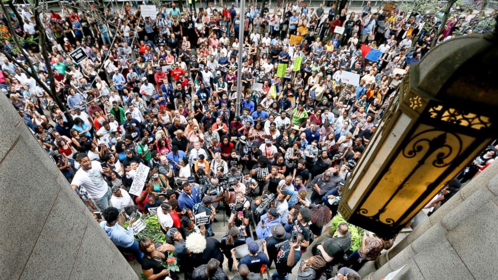 PHOTO: Protesters swarm the front of the Allegheny County Courthouse as they rally, June 21, 2018 in Pittsburgh for the killing of Antwon Rose Jr. who was fatally shot by a police officer.