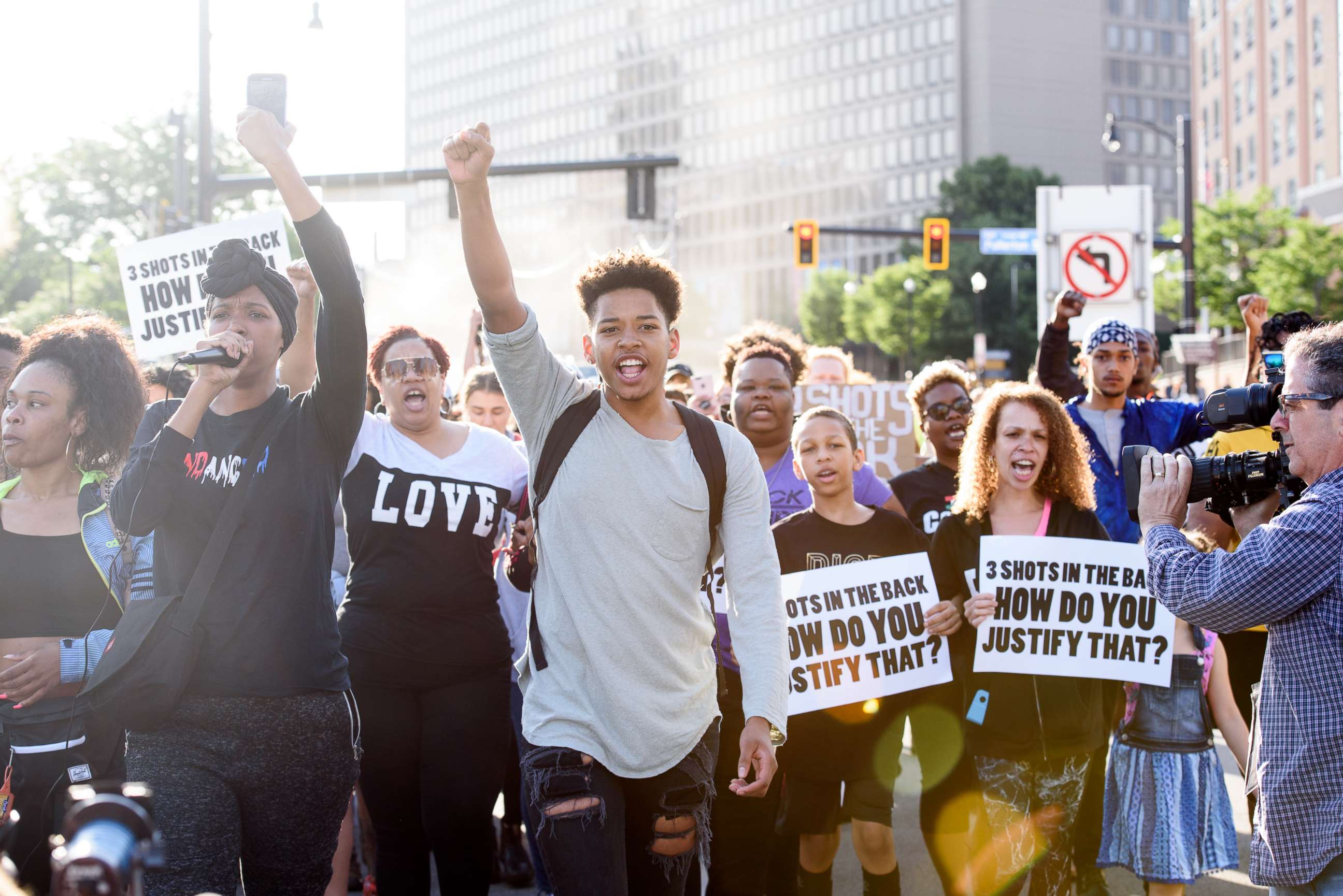 PHOTO: Christian Carter, 18, of East Liberty, Pa., leads protesters a day after the funeral of Antwon Rose II on June 26, 2018 in Pittsburgh.