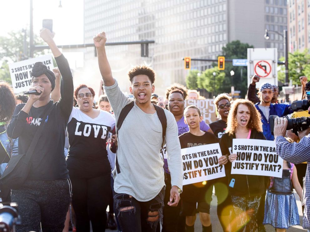 PHOTO: Christian Carter, 18, of East Liberty, Pa., leads protesters a day after the funeral of Antwon Rose II on June 26, 2018 in Pittsburgh.