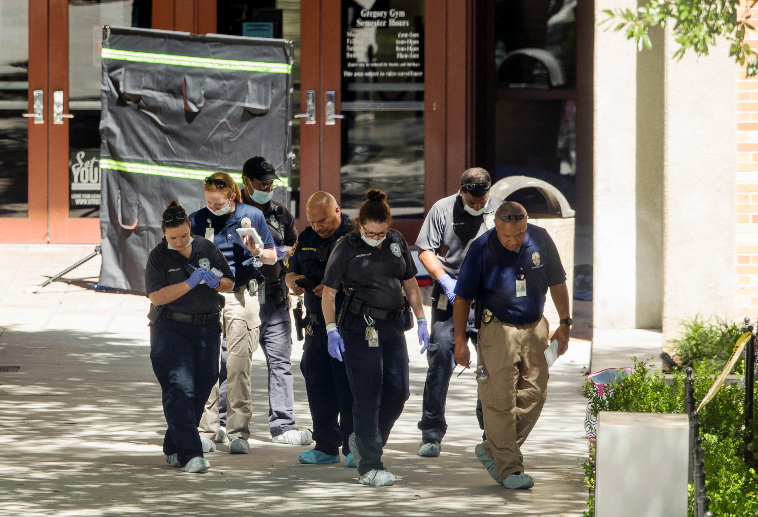 PHOTO: Officials investigate after a fatal stabbing attack at the University of Texas campus, May 1, 2017, in Austin, Texas.