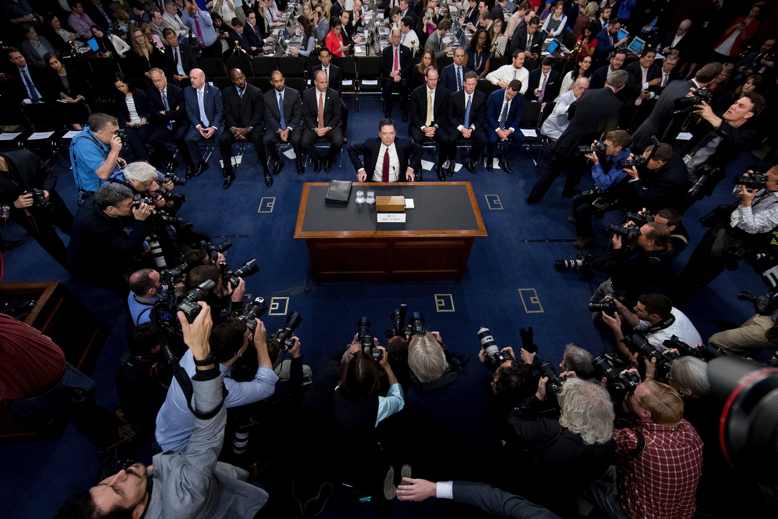 PHOTO: Former FBI Director James Comey takes his seat to testify at a Senate Intelligence Committee hearing on Capitol Hill, June 8, 2017, in Washington, D.C. 