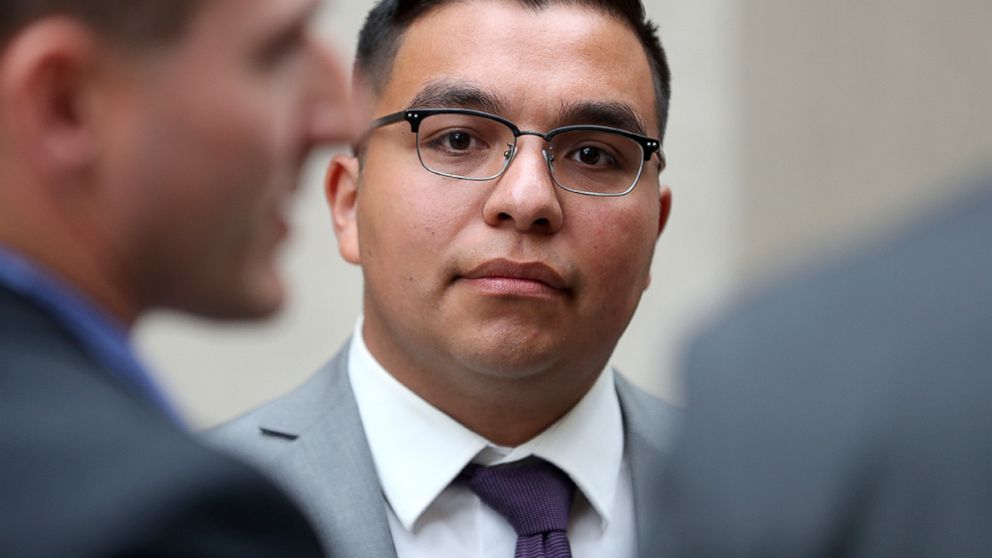 St. Anthony Police Officer Jeronimo Yanez stands outside the Ramsey County Courthouse while waiting for a ride in St. Paul, Minn., May 30, 2017,.