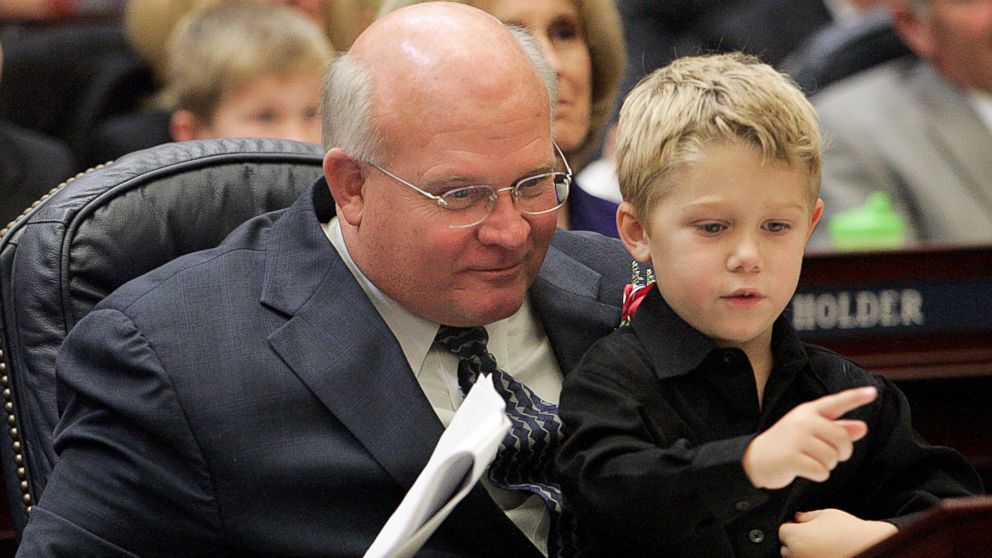 PHOTO: Here, then-Representative Baxley entertains his grandson in the Florida House of Representatives in Tallahassee, Fla., Nov. 21, 2006.